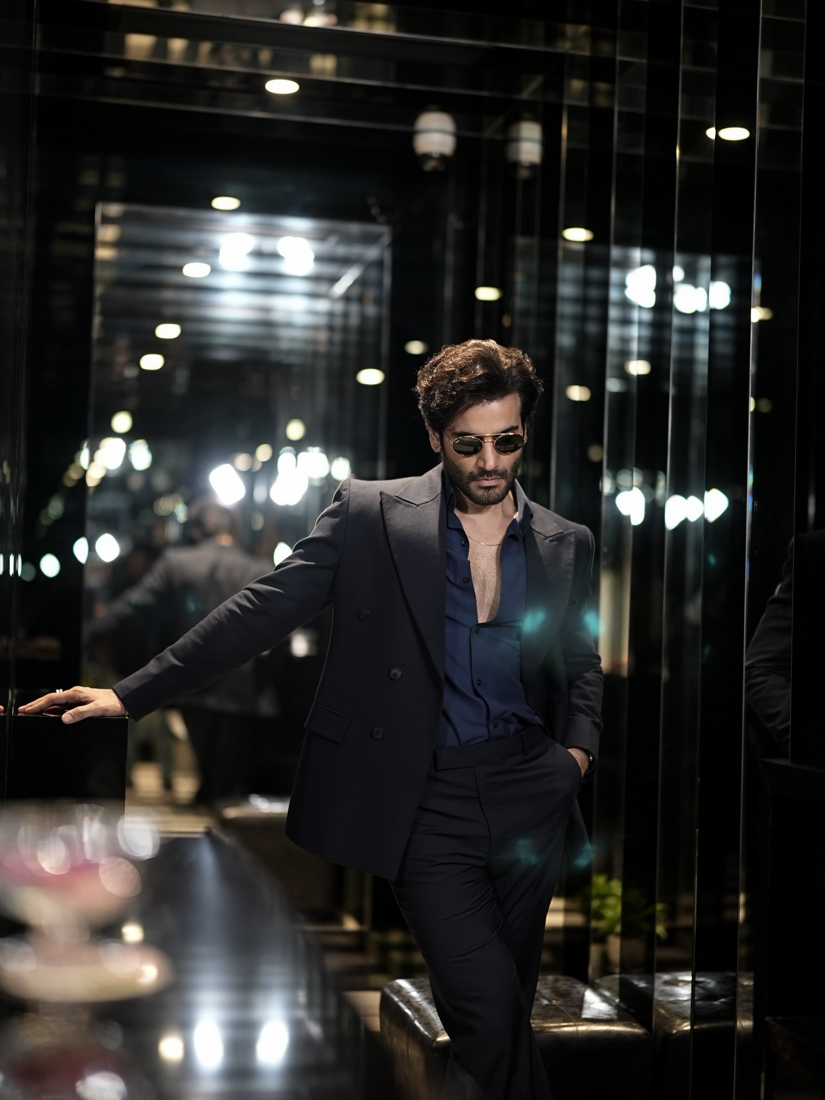 Why Karan Tacker Keeps Coming Back to a Suit